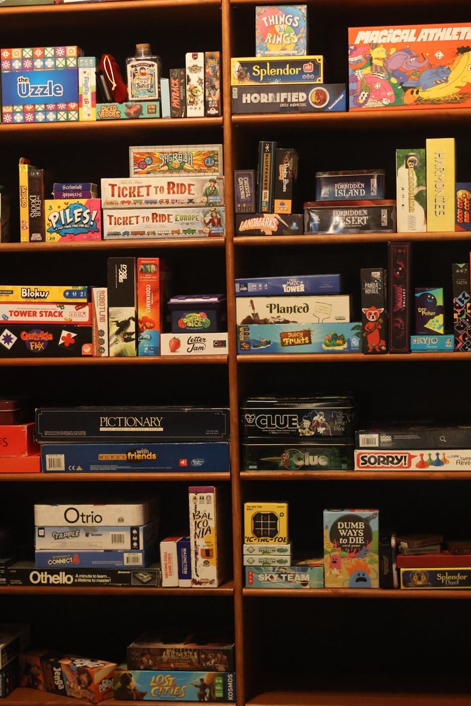 A full wall of board games at the Vault